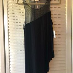 Free People Nwt Black Angled Tunic Sleeveless Top. Sz Med. Sheer Angled Top And Back. Lightweight, Dress Up Or Down Chic Sleeveless Sheer Top, Sheer Sleeveless Top For Night Out, Casual Sheer Tank Top For Party, Sheer Tank Top For Night Out, Black Sheer Sleeveless Top, Black Sheer Tank Top For Evening, Sheer Sleeveless Casual Tank Top, Sheer Sleeveless Tank Top For Spring, Casual Sheer Sleeveless Tank Top