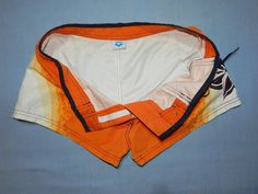 "AMAZING WOMEN'S BEACHWEAR SURFING SHORT SHORTS. AUTHENTIC ARENA SWIMWEAR. STYLED IN ITALY. GOOD CONDITION . WASHED AND SANITIZED. ORANGE AND WHITE MAIN COLORS. LABEL SIZE : XS / S .Please to better fit read the Measurements below . Waist 15.5 inch , 40 cm. Round Waist 30\". Lenght 9 inch , 23 cm. Washed and Sanitized We Post from Italy This is a PRIVATE SALE The Photos are Real of the Items I sell in this auction. IF YOU HAVE QUESTION PLEASE CONTACT ME BEFORE BIDDING NO RETURN" Arena Swimwear, Olympic Triathlon, Angie Smith, Womens Sports, Beachwear For Women, Vintage Adidas, Short Shorts, Classic Beauty, Ski Jacket