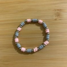 Pink and gray clay bead bracelet Grey Clay Bead Bracelet, 50 Sent, Beaded Braclets, Holiday Bracelets, Clay Bead Bracelet, Bracelet Inspo, Gray Bracelet, Bead Charms Diy, Clay Bracelet