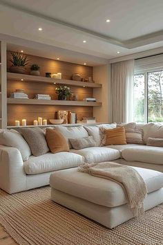 a living room filled with lots of white furniture