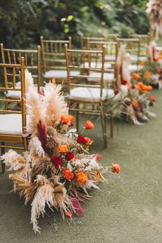 rows of chairs with flowers and feathers on them