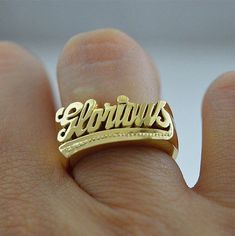 A name ring is a unique and personal way to express your identity and style. Whether you want to wear your own name, a loved one's name, or a meaningful word, you can customize your ring with up to 10 letters in a beautiful script font. The ring is made of high-quality sterling silver with a choice of gold or rose gold overlay for a stunning finish. The ring comes in a lovely gift box and is available in different sizes. A name ring is a perfect gift for yourself or someone special on any occasi Woman Rings, Ring Name, Name Ring, Cursive Font, Name Rings, Dope Jewelry, Pompano Beach, Knuckle Rings, Custom Ring