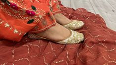 Introducing our exquisite collection of Punjabi Juttis, the perfect fusion of tradition and modern style. These are more than just shoes; they're a statement of cultural heritage and fashion-forward elegance. Our Punjabi Juttis are a celebration of Indian craftsmanship, carefully handcrafted to adorn the feet of brides, partygoers, and women who appreciate the beauty of ethnic footwear. Elegant Embellishments: Our Punjabi Juttis are a true embodiment of artistry. These party wear shoes are metic Traditional Wear For Wedding With Handwork For Diwali, Traditional Wear With Handwork For Wedding And Diwali, Traditional Wedding Wear With Handwork For Diwali, Festive Embroidered Wedding Shoes For Reception, Embroidered Ankle-length Traditional Wear For Diwali, Embroidered Ankle-length Traditional Wear For Festive Occasions, Ankle-length Traditional Wear For Festivals, Wedding Shoes With Dori Work For Festive Occasion, Traditional Open Toe Wedding Shoes For Festive Occasion