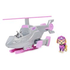 a toy helicopter with a dog next to it