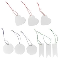 four tags with heart shapes hanging from them