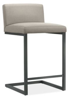 an upholstered bar stool with a beige seat and metal frame, viewed from the front