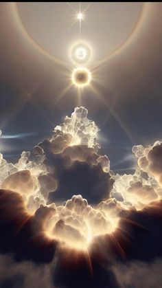 the sun shining through clouds with an image of a star in the sky above it