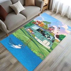 the rug is on the floor in front of a couch and loveseat with an animal theme