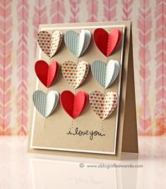 a card with hearts on it that says i love you