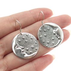 Great vintage condition.  925 Sterling Silver Vintage Man in The Moon Dangling Earrings  Weight: 10.2g   WELCOME TO PAWN SHOP We are an actual pawn shop and have been in business for over 25 years. Since 1990, our establishment has been serving a variety of clients by providing them with short term cash solutions and options of liquidity regarding their treasured heirlooms. Acknowledging that today′s customers are very sophisticated and are looking for a variety of investments, our acquisitions Vintage Sterling Silver Moon Jewelry, Vintage Moon Shaped Sterling Silver Jewelry, Vintage Moon-shaped Sterling Silver Jewelry, Sterling Silver Moon Charm Earrings For Anniversary, Sterling Silver Celestial Earrings For Gift, Vintage Moon-shaped Earrings For Gift, Sterling Silver Moon-shaped Earrings For Anniversary, Vintage Moon Shaped Earrings For Gift, Sterling Silver Moon Earrings For Anniversary