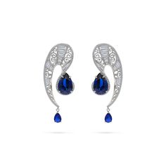 The QUEEN Earrings, inspired by the ancient Mongolian queens and their iconic coiffure, were created as a testament to the enduring strength of women and as an ode to the majestic essence of queenship for the modern woman. Luxury Blue Chandelier Earrings For Formal Occasions, Luxury Blue Diamond Drop Earrings, Luxury Blue Earrings For Evening, Luxury Blue Earrings For Evening Wear, Luxury Blue Pierced Earrings, Blue Single Earring For Evening, Elegant Blue Pierced Chandelier Earrings, Globe Gift, Queen Earrings