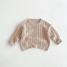 Cute Beige Soft Knit Sweater, Soft Cotton Sweater For Fall, Fall Cotton Sweater With Soft Texture, Soft Texture Cotton Sweater For Fall, Cute Solid Color Fall Sweater, Cute Cream Long Sleeve Sweater, Cute Warm Cotton Sweater, Soft Cotton Winter Sweater, Soft Cotton Sweater For Winter