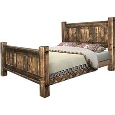 a bed made out of wood with a wooden headboard and foot board