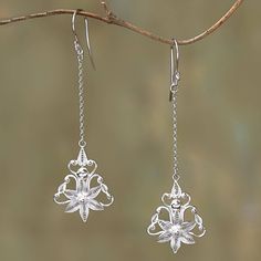 Raining elegantly from the ears two flowers are handcrafted with intricate sterling silver filigree. Javanese artisan Selly Sagita designs these dangle earrings which feature lengths of petite sterling chain. Flower Rain, Ad Earrings, Art Nouveau Earrings, Art Nouveau Earring, Two Flowers, Filigree Earrings, Earrings Flower, Sterling Silver Filigree, Silver Filigree