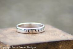 Personalized Hand Stamped Ring  Sterling by betsyfarmerdesigns, $25.00 Simple Personalized Sterling Silver Stackable Rings, Inspirational Personalized Sterling Silver Rings, Personalized Sterling Silver Engraved Ring For Everyday, Everyday Silver Engraved Ring With Custom Name, Simple Personalized Sterling Silver Ring, Southern Jewelry, Hand Stamped Ring, Stamped Ring, Typewriter Font