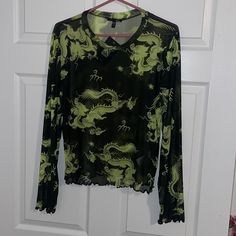 Green And Black Mesh Fashion Nova Shirt. Never Been Worn. Size Xl. Long Sleeve Shirt Long Sleeve Grunge Tops For Spring, Grunge V-neck Tops For Summer, Grunge V-neck Summer Tops, Summer Grunge V-neck Tops, Y2k Long Sleeve Summer Shirt, Green V-neck Y2k Tops, Y2k Long Sleeve Shirt For Spring, Y2k Style Long Sleeve Summer Shirt, Edgy Long Sleeve Summer Blouse