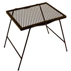 a metal tray that is sitting on top of a table with two legs and an iron frame