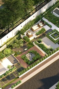 an aerial view of a house with lots of greenery on the roof and walls