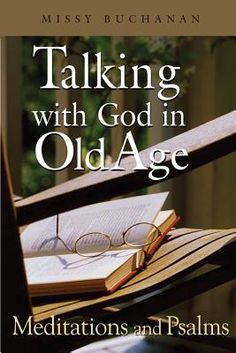 a book sitting on top of a wooden chair next to an open book and reading glasses