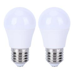 two white light bulbs sitting next to each other