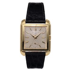 This Patek Philippe Cioccolatone wristwatch is a luxurious timepiece with a square shape and a 30mm case size. The watch features a smooth and fixed gold bezel, a two-piece black leather strap, and a silver dial color. The indices are stick indexes, and the watch is Swiss made with acrylic crystal. The watch has a mechanical (manual) movement, a push/pull crown, and a small second. It comes with features like a 12-hour dial, solid caseback, and is not vintage. The watch is perfect for men who are looking for a classic and dressy watch that will complement any outfit. Ref # 2486 Movement # 958645 Caliber # 10-200 Serial # G72XXX Lady Watch, Vintage Timepiece, Patek Philippe, Swiss Made, Square Shape, Luxury Watch, Box Packaging, Cigars, Accessories Watches