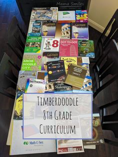 there is a sign that says timberdale 8th grade curricuum on the table