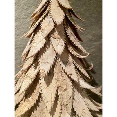 a close up of a wooden christmas tree