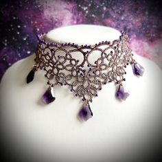 Delicate choker in fantasy victorian style. It was made by hand using the tatting lace method. Gold and purple thread with delicate shine fits glass crystals. Necklace is a part of gothic collection of tiaras and colliers. Necklace is ideal for evening stylization or even wedding. Necklace length is 29-35 centimeters. Clasp and chain from surgical steel in golden color The tatting lace is an extremely precise and labor-intensive technique. It consists of thousands knots tied manually using a shu Fantasy Choker, Fantasy Victorian, Tatting Necklace, Purple Gothic, Delicate Choker, Dragon Princess, Victorian Necklace, Crystals Necklace, Gold And Purple