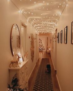 the hallway is decorated with christmas lights and decorations