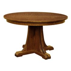 a round wooden table with two leaves on the top and one leaf at the base