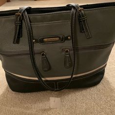 Stone & Co Shoulder Tote Bag. New With Tags. Beautiful Grey/Bone And Black Color Bag. Exterior Tote Has 2 Zippered Compartments In The Front Plus An Open Pocket By The Handle. Top Zipper Closure. Interior Is Spacious With Several Compartments. Middle 1 With A Zipper Closure, 1 With 2 Open Slot Pockets, And 1 With Small Zipper Pocket. Measures 17 X 11 X 5. Very Sharp Looking Tote Bag. Please See Pictures For Details. Gray Bags With Zipper Closure For Errands, Gray Double Handle Satchel For Errands, Gray Satchel For Errands, Gray Double Handle Shoulder Bag For Errands, Gray Satchel With Removable Pouch For Errands, Gray Shoulder Bag With Double Handle For Errands, Gray Tote Satchel For Errands, Gray Tote Bag For Errands, Gray Zipper Bag For Shopping