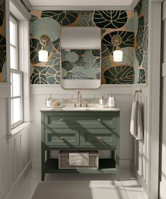 a bathroom with a green vanity and gold wallpaper