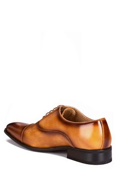 A crisp cap toe complements the polished finish of this faux-leather oxford that's sure to add professional polish to any ensemble. Synthetic upper/leather lining/rubber sole Imported Fall Fitted Goodyear Welted Oxfords, Fall Oxfords With Cap Toe, Classic Oxfords For Derby In Fall, Classic Oxfords For Fall Derby, Fall Leather Lining Oxfords For Derby, Fitted Oxfords With Plain Toe For Fall, Cap Toe Oxfords With Leather Footbed For Office, Fall Derby Oxfords With Leather Lining, Fitted Oxfords For Fall Derby