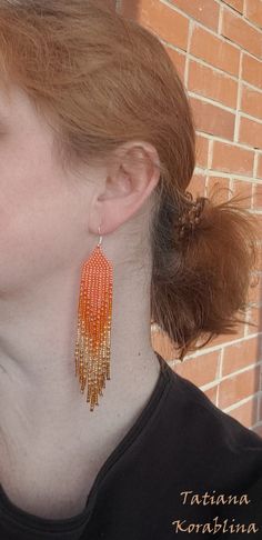 These unique handmade earrings are made of high-quality Czech beads and strong synthetic thread. They are elegant, fashionable, and highly versatile, suitable for everyday wear. Color: orange, gold, bronze . There may be some color discrepancies which is due to the different monitor settings I will make these earrings for you in your favorite size. 100% hand made with love! Measurements: Length-about 11cm (4.3 inch) Width -about 2 cm (0.79 inch) Materials: Sterling silver components Czech glass Orange Adjustable Beaded Drop Earrings, Adjustable Orange Beaded Drop Earrings, Handwoven Orange Beaded Earrings For Gift, Handwoven Orange Beaded Earrings As Gift, Orange Tiny Beads Drop Earrings, Orange Beaded Drop Earrings, Orange Drop Earrings With Tiny Beads, Orange Handwoven Beaded Earrings, Orange Beaded Earrings With Gold Round Beads