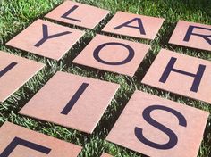 cardboard letters laid out in the grass that spell out your wish