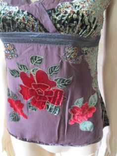 "Brown vest top with red\\green\\gold velvet flowers and detail.  It has a V neck and velvet bra straps.  The back is plain, it has some stretch and is in good condition. Bust  flat;  16\" Length;  22\" Made by MANOUKIAN cotton  silk  viscose" Velvet Bra, Embroidered Vest, Brown Vest, Velvet Flowers, Retro Tops, Vintage Vest, Gold Velvet, Boho Top, Top Vintage