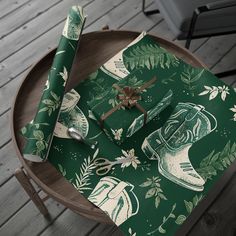 a green wrapping paper on top of a wooden table