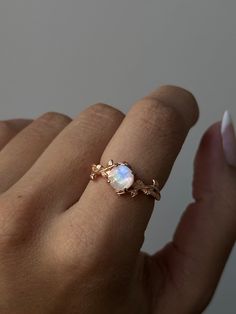 Embrace the beauty of nature and the moon with the Lunar Blossom Ring. Crafted from rose gold-plated sterling silver, this delicate piece features a luminous moonstone set among vine-like details. A perfect blend of elegance and whimsy, this ring is a must-have for any jewelry collection The Beauty Of Nature, Moonstone Ring, Ring Size Guide, Earrings Collection, Gold Plated Sterling Silver, Ring Bracelet, Rose Gold Plates, The Moon, Moonstone