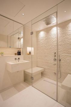 a photo of a bathroom with a shower and sink