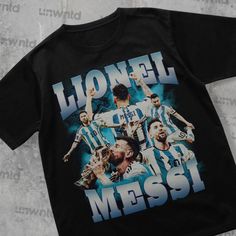 a t - shirt with the image of two men on it that says, honel and messi