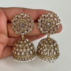 Antique Polki kundan Jhumka/stone Jhumka/Indian Jewelry/Pakistani Jewelry/Punjabi Jewelry/Statement earrings/Bridal earring/Indian wedding Length 2.25 inches Width 1 inche This is 100% Handmade jewelry. So Color, shades, texture displayed may slightly vary from the actual product due to digital image limitations. We request you to consider these minor variations. Please expect the possibility of some slight imperfections when buying hand made jewelry. If you have any questions, please message or Luxury Kundan Round Jhumkas, Luxury White Jhumkas With Latkans, Luxury Kundan Jhumkas For Eid, Luxury Kundan Jhumkas With Gota Work, Luxury Festive Stone Work Jhumkas, Indian Bridesmaids Earrings, Luxury Kundan Temple Jewelry Jhumkas, Luxury Hand Set Jhumkas For Wedding, Kundan Meenakari Bridal Earrings For Celebration