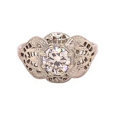 18k White Gold Filigree Art Deco .60ct Genuine Natural Diamond Ring (#J4895) Art Deco 18k white gold filigree ring featuring a round brilliant cut diamond weighing .60cts. The diamond has VS clarity and I-J color and measures about 5.5mm. The ring fits a size 4 finger and weighs 1.7 dwt. It dates from the 1920's. Beautiful! Inv#RD5276. SKU#J4895. 100% Satisfaction Guaranteed! Luxury Oval Filigree Ring In Art Deco Style, Luxury Filigree Ring With Round Accent Stones, Luxury Gold Filigree Ring With Brilliant Cut, Luxury Exquisite Filigree Ring With Round Cut, Luxury Victorian Filigree Ring With Center Stone, Luxury Art Deco Filigree Ring With Round Cut, Luxury Art Deco Oval Filigree Ring, Luxury Filigree Ring With Brilliant Cut As Gift, Luxury Filigree Anniversary Ring, Fine Jewelry Style