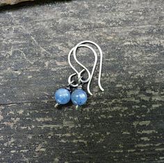 Kyanite sterling silver earrings6mm kyanite gemstones dangle lightly from sterling silver hand formed hooks.Made to order ~ minor variations in stone character Handmade Small Sterling Silver Earrings, Handmade Blue Sterling Silver Earrings, Dainty Blue Gemstone Earrings, Dainty Handmade Earrings For Everyday, Small Handmade Sterling Silver Earrings, Small Handmade Dainty Earrings, Blue Stone Earrings, Jewelry Sale, Tiny Earrings