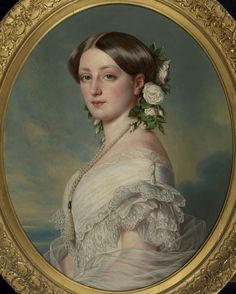 a portrait of a woman wearing a white dress with flowers in her hair