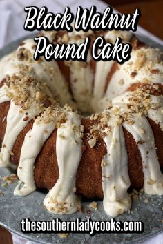 a bundt cake with white icing on a plate