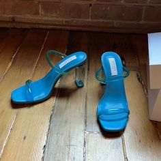 Brand New Trendy Blue Sandals With Heel Strap, Modern Blue Sandals With Block Heel, Chic Turquoise Sandals For Summer, Modern Blue Block Heel Sandals, Modern Blue Ankle Strap Sandals, Trendy Blue Evening Sandals, Modern Blue Heels With Heel Strap, Chic Turquoise Open Toe Sandals, Modern Blue Open Toe Sandals