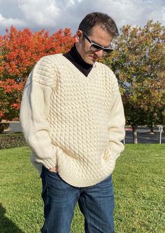 Winter Men's Sweater. Ivory hand knit sweater. Men | Etsy White Merino Wool Knitted Sweater, White Knitted Merino Wool Sweater, White Hand-knitted Merino Wool Sweater, White Hand Knitted Merino Wool Sweater, White Wool Knitted Sweater, Classic Hand Knitted Sweater For Winter, White Wool Sweater With Knitting Details, White Wool Knit Sweater, Winter White Textured Knit Polo Sweater