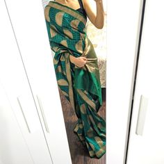 Beautiful Blue/Green Silk Patola Saree With Gold Pattern All Over That I Have Never Actually Worn. Comes With Matching Green Blouse Piece Shown In Last Photo That You Can Use To Get The Blouse Stitched. Like New Without Tag. Elegant Green Pre-draped Saree With Gota Work, Elegant Green Saree With Gota Work, Green Silk Saree With Gota Work, Party Green Dupatta With Zari Weaving, Green Pre-draped Saree With Cutdana For Celebration, Green Cutdana Pre-draped Saree For Celebration, Green Pre-draped Saree For Celebration, Green Saree With Zari Weaving For Party, Green Silk Saree For Celebration