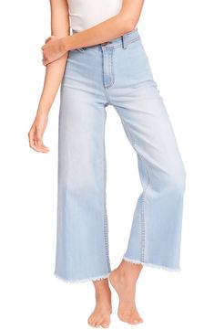 High-rise trouser jeans are ready for a stroll by the beach in light-wash, low-stretch denim with frayed hems and an easygoing wide-leg silhouette. Style Name:Billabong Free Fall Frayed Wide Leg Trouser Jeans. Style Number: 6231411. Faded Wide-leg Bottoms With Frayed Hem, Non-stretch Wide Leg Bottoms With Frayed Hem, Wide-leg Denim Flare Jeans With Frayed Hem, Light Wash Wide Leg Pull-on Jeans, Light Wash Wide-leg Jeans With Frayed Hem, Indigo Jeans, Fall Pants, Billabong Women, Womens Wetsuit