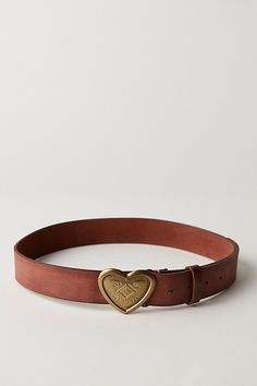 Designed to add a versatile, vintage-inspired touch to every look, this forever timeless belt is featured in a classic leather silhouette with western-style, metal heart buckle at center for the perfect finishing touch. | Corazon Leather Belt by Free People in Brown, Size: S/M Womens Western Belt, Cute Belts, Unique Belts, Clothing Aesthetics, Belt Gold Buckle, Belt Gold, Metal Heart, Heart Eyes, Buckle Belt